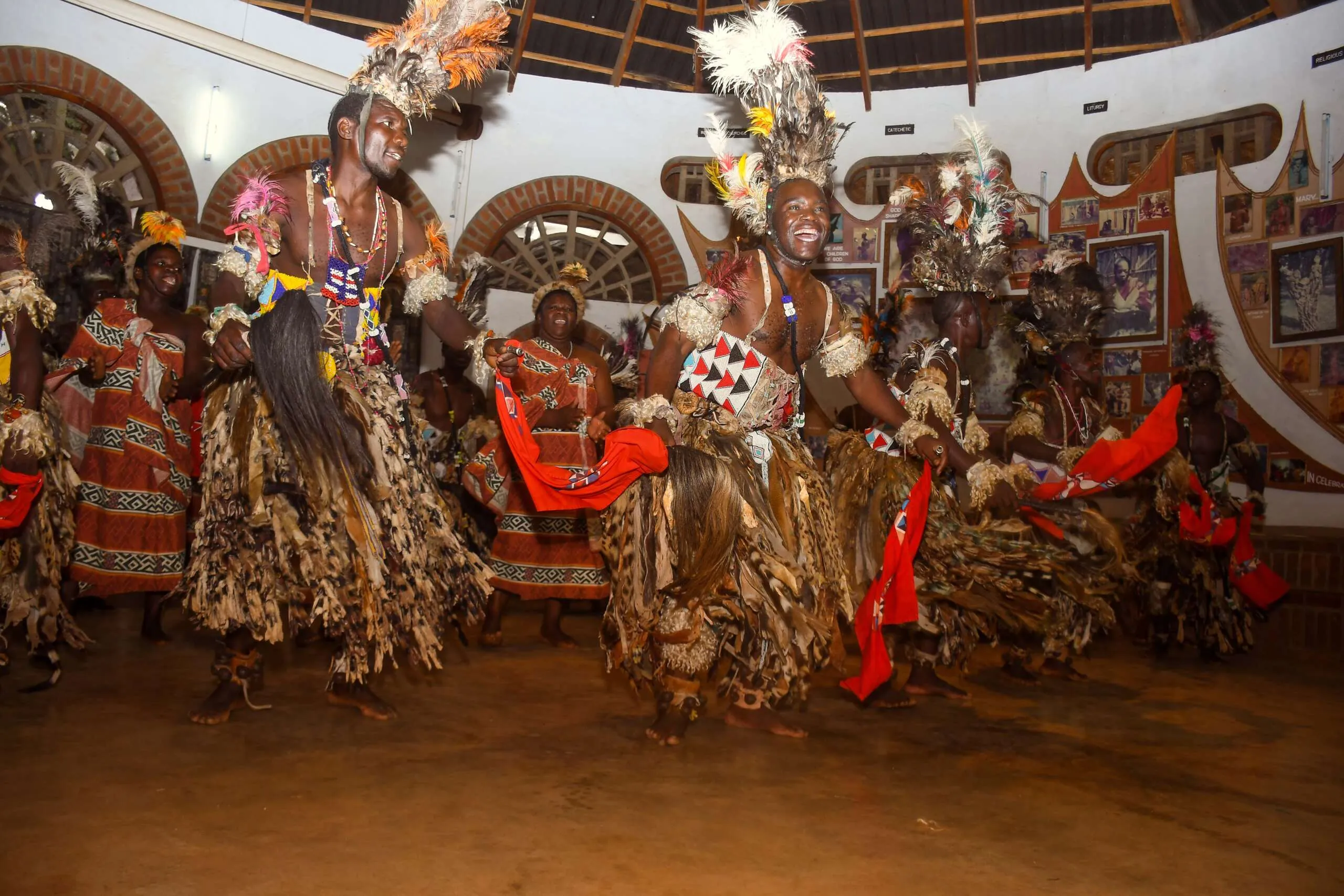 Traveller pointing towards the horizon in Malawi, enjoying the open landscape