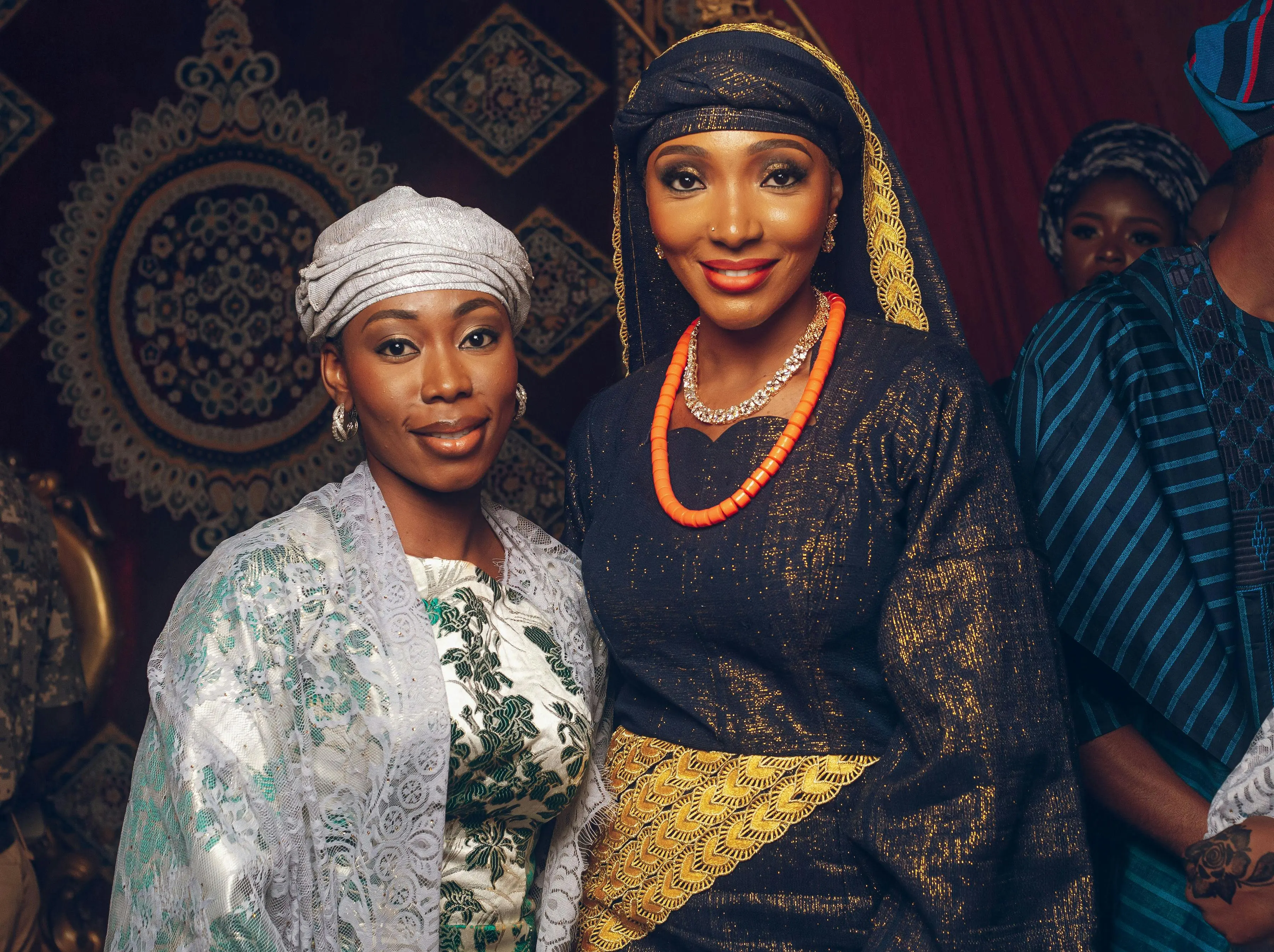 Malawian woman in vibrant chitenje fabric at a traditional ceremony